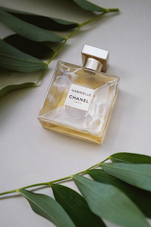 A bottle of Gabrielle Essence Eau De Parfum